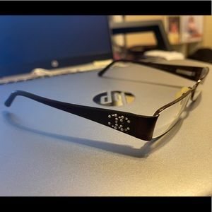 Chanel frame for prescription lenses.  Lady’s.
